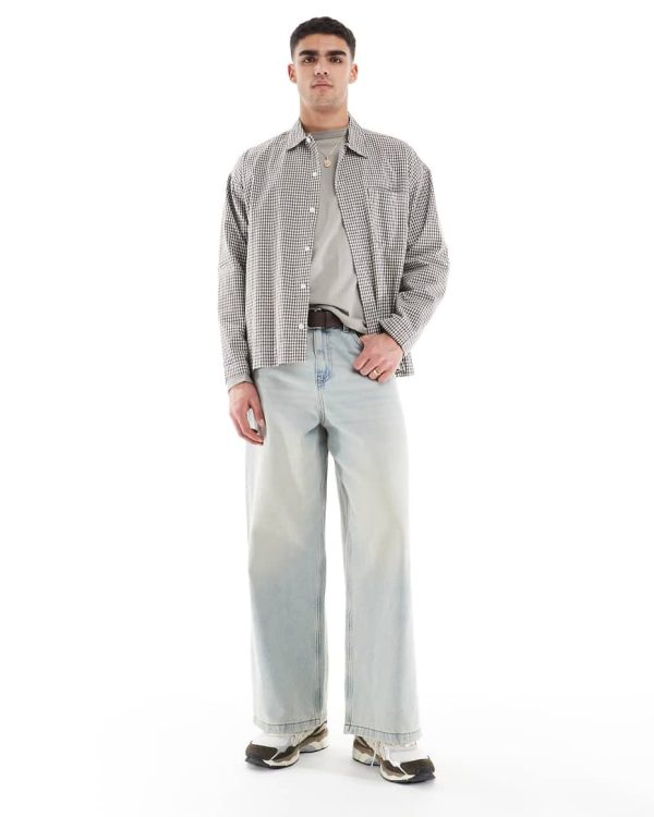 ASOS DESIGN super baggy fit jeans with vintage tint in light wash blue