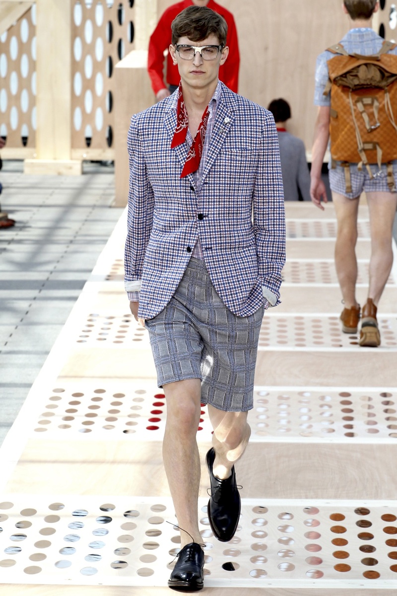A model walks the runway at the Louis Vuitton Spring Summer 2014