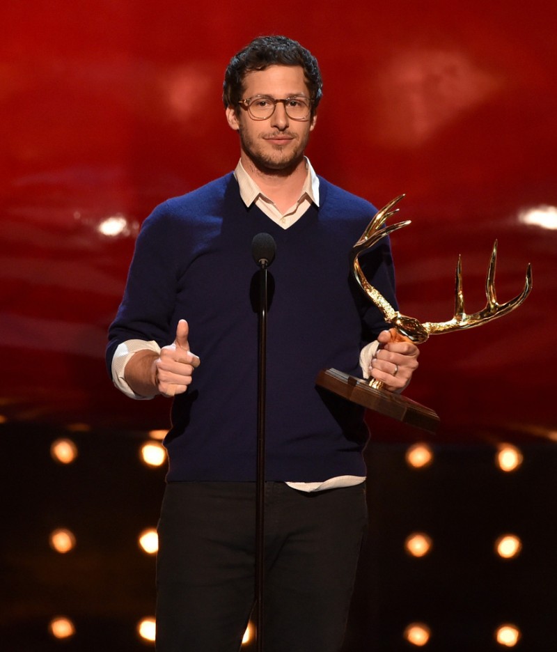 Andy Samberg was smart but strategically disheveled in a sweater and dress shirt.