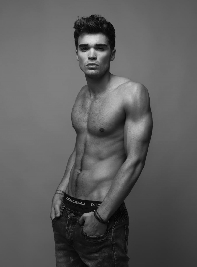 Josh wears jeans Underated and underwear Dolce & Gabbana.