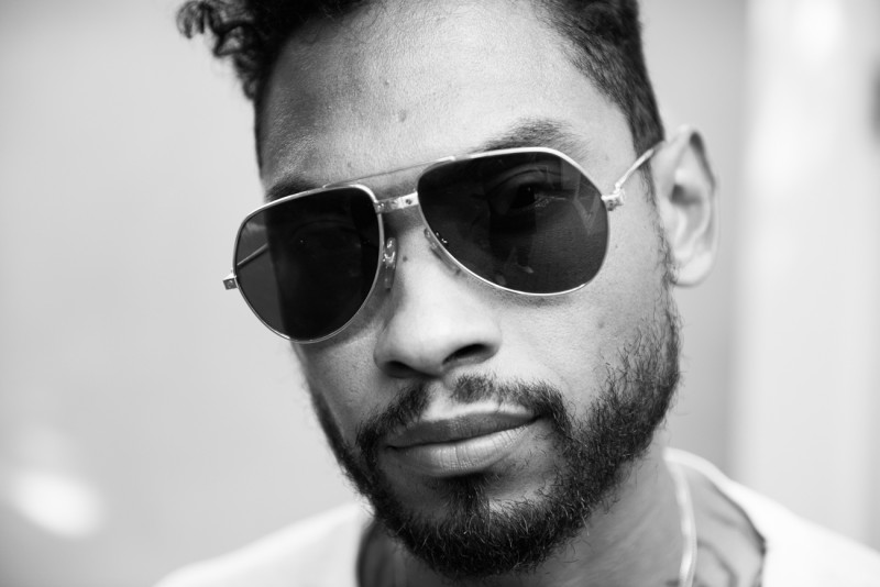 Miguel rocks a pair of aviator sunglasses for a relaxed shoot with The Coveteur.