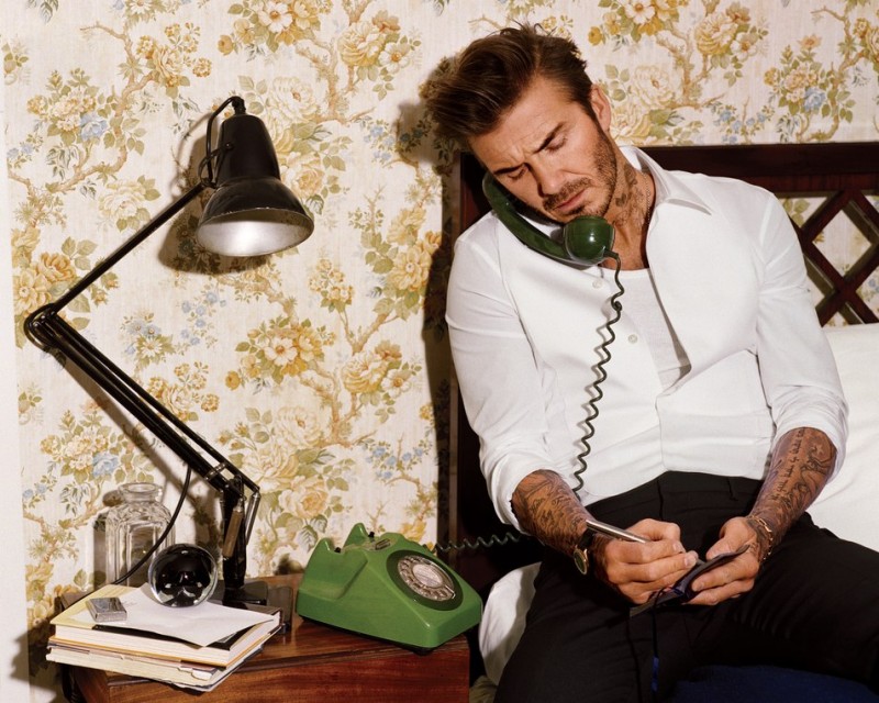 David Beckham wears tuxedo shirt Giorgio Armani, tank Calvin Klein Underwear, vintage watch Rolex and bracelet Cartier.