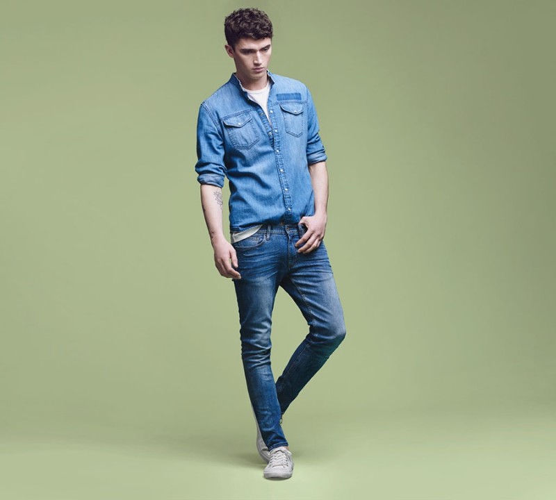 Young attractive asian male model, wearing denim jacket and pants, posing  men's fashion and style on a white studio background - Stock Image -  Everypixel