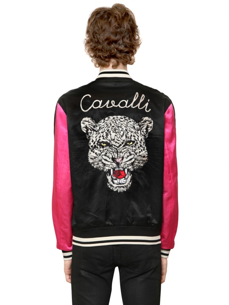 Roberto Cavalli's reversible satin souvenir jacket features a menacing tiger embroidery. 
