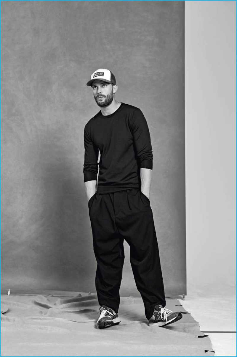 Going casual, Jamie Dornan wears a Fay tee, relaxed Marni trousers, and his own cap with New Balance sneakers for Icon El País.