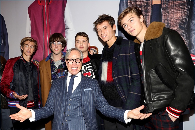 All smiles, Tommy Hilfiger poses with Presley Gerber, Gabriel-Kane Day-Lewis, Rafferty Law, Julian Ocleppo, and Lucky Blue Smith.