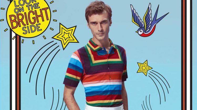 Clément Chabernaud dons a colorful polo and white trousers by Paul Smith.