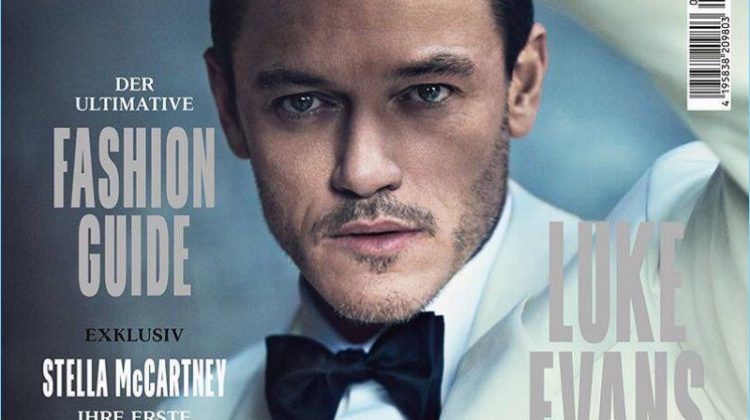 Luke Evans wears an off-white tuxedo jacket and black bow-tie for the cover of GQ Style Germany.