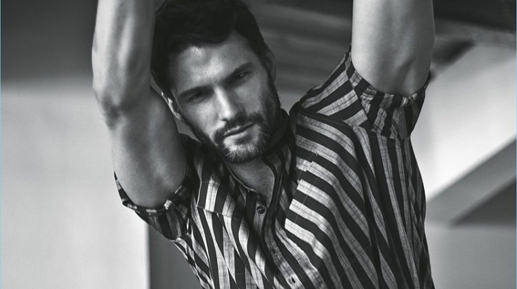 Tomas Skoloudik sports a striped Dolce & Gabbana shirt with Emporio Armani underwear and Adidas shorts.