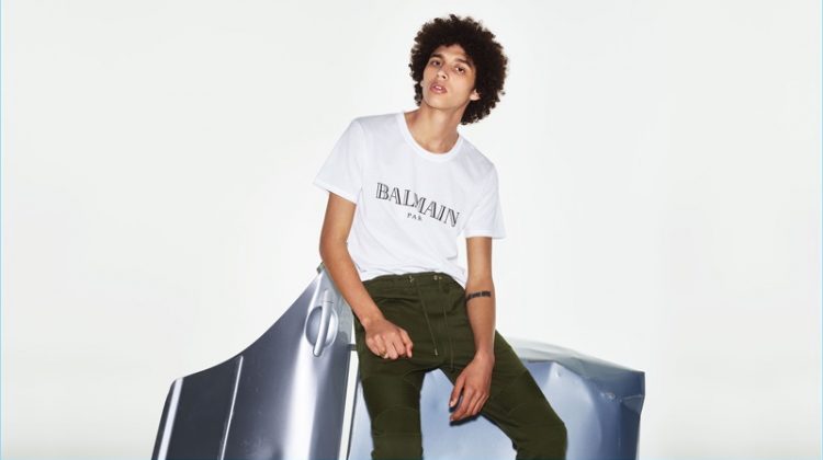 The logo trend is alive and well as Jackson Hale rocks a Balmain logo-print cotton T-shirt, and biker cotton track pants.
