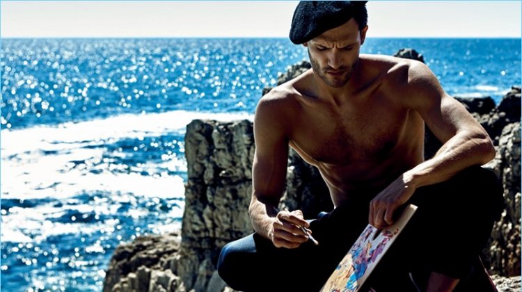 Painting at the beach, Ricardo Oliveira dons COS chinos with Havaianas shoes.
