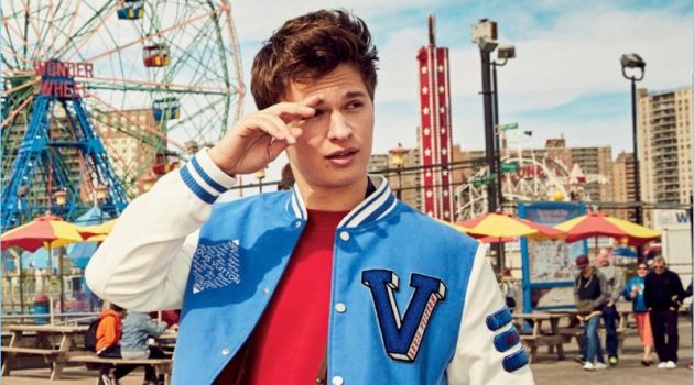 Actor Ansel Elgort wears an AMI sweatshirt with jeans and a jacket by Louis Vuitton.