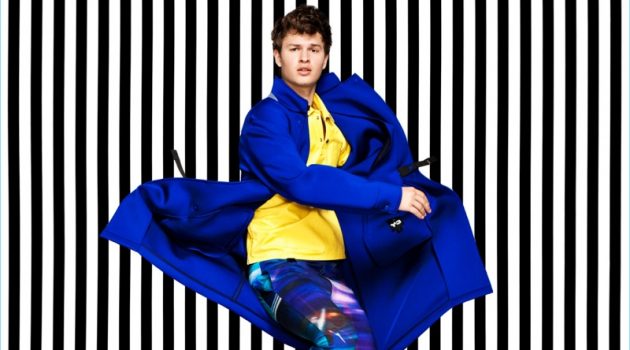 Making a colorful statement, Ansel Elgort rocks a blue Y-3 coat.