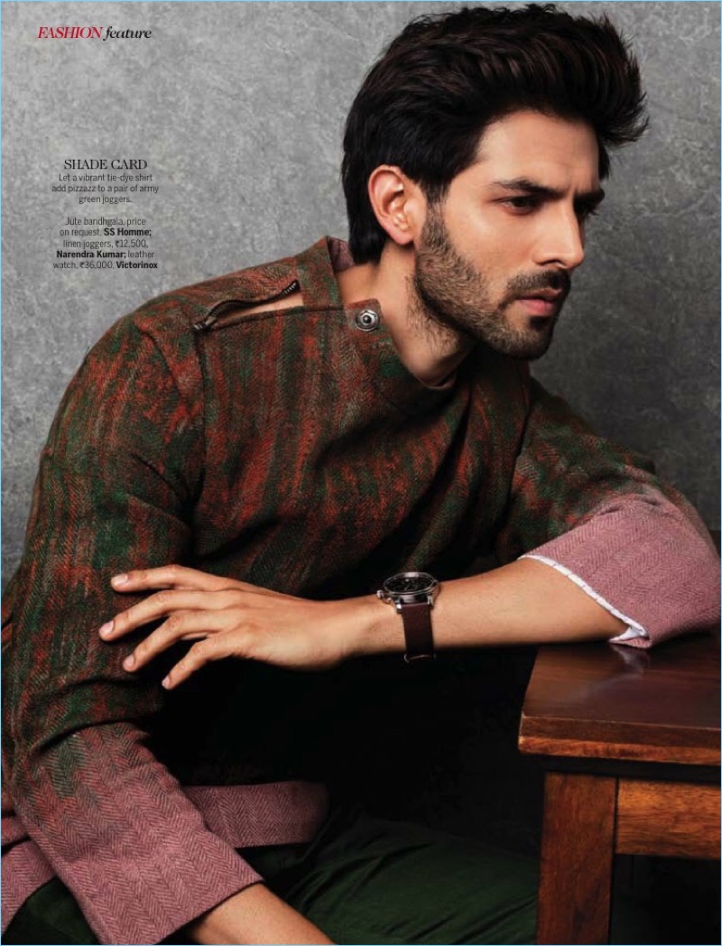 Stealing a quiet moment, Kartik Aaryan wears a SS Homme top with Narendra Kumar joggers, and a Victorinox watch.