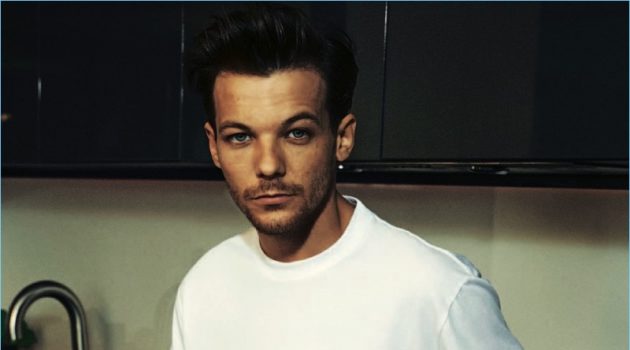 Singer Louis Tomlinson embraces sporty style for the pages of The Observer magazine.