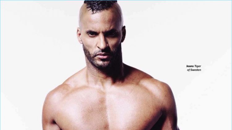 Appearing in a shirtless picture, Ricky Whittle wears Tiger of Sweden jeans.