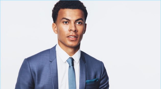 Dele Alli dons a sharp Dior Homme suit, shirt and tie with a Tod's belt for British GQ.