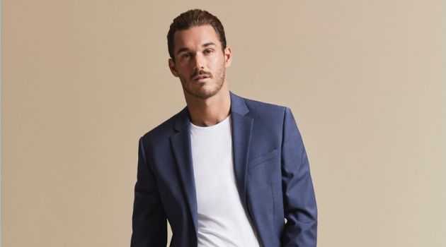 Making a case for the t-shirt and suit look, David Alexander Flinn appears in Express' fall 2017 campaign.