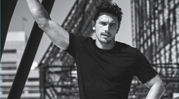 Taking to a roof top, James Franco wears a Giorgio Armani t-shirt with Fabric Brand & Co. denim jeans.