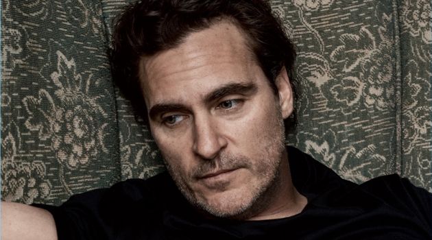 Relaxing, Joaquin Phoenix sports a Ralph Lauren t-shirt.