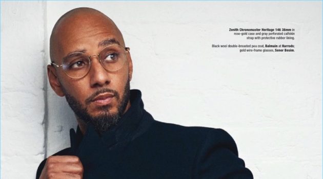 A sharp vision, Swizz Beatz wears a Balmain peacoat with Sener Besim sunglasses and a Zenith watch.