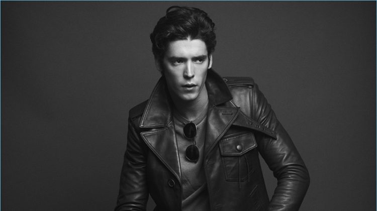 A cool vision, Pico Alexander wears a Lanvin leather jacket with an Officine Generale pullover. He also sports Topman jeans with Salvatore Ferragamo loafers.