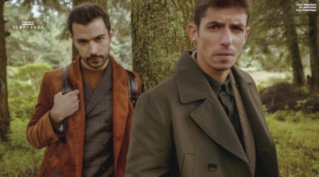 Diego Alfaro wears a H&M coat and sweater with a Montblanc backpack. He also sports a Welton & Sons suit. Alberto Guerra dons a Bottega Veneta shirt with a Welton & Sons suit, and Original Penguin coat.