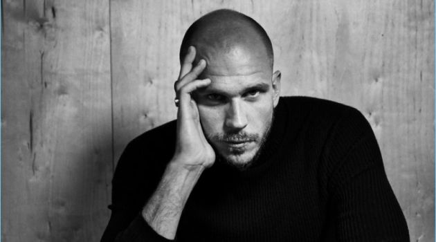 Connecting with The Laterals, Gustaf Skarsgård sports a Theory turtleneck. He also wears Hugo Boss trousers and a Bell & Ross watch.