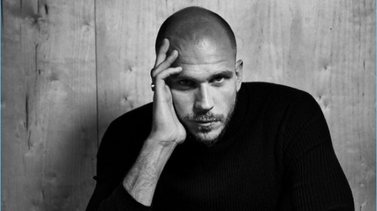 Connecting with The Laterals, Gustaf Skarsgård sports a Theory turtleneck. He also wears Hugo Boss trousers and a Bell & Ross watch.