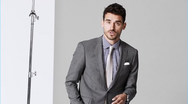 Model Arthur Kulkov wears Todd Snyder's stretch Italian wool Sutton suit in light grey.