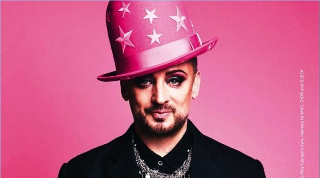 Sporting another one of his own hats, Boy George rocks a Maison Margiela shirt with a Pebble London necklace and his own pieces.