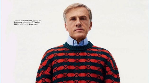 Actor Christoph Waltz wears a Valentino sweater, Burberry shirt, and Cerruti 1881 pants.