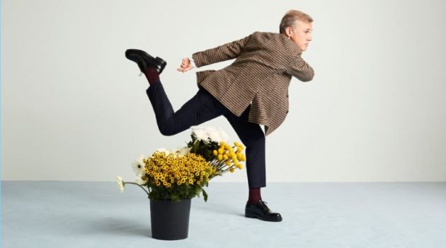 Actor Christoph Waltz wears an Incotex blazer, Sandro trousers, and AMI shoes.