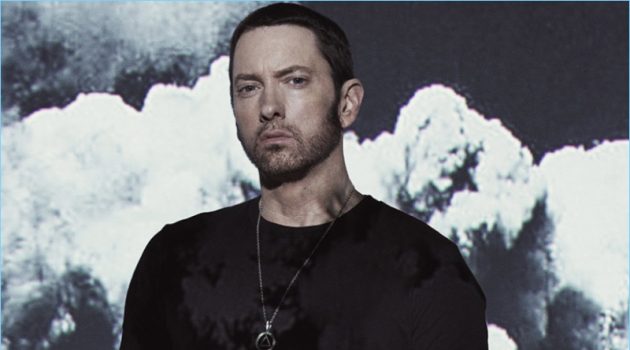 Rapper Eminem wears a Goodlife t-shirt with AllSaints pants.