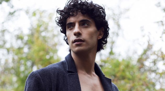 Reza wears coat Andrew Coimbra and trousers Saint Laurent.