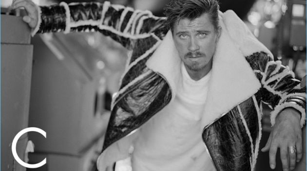 Actor Garrett Hedlund wears a Balmain jacket with a Buck Mason t-shirt.