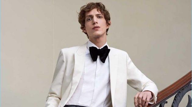 Dressed for a formal event, Xavier Buestel wears a Saint Laurent tuxedo jacket with a Valentino shirt. He also dons Lemaire trousers and a Prada leather belt.