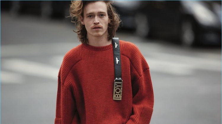 Actor Caleb Landry Jones wears a N. Hoolywood sweater with a vintage belt from What Goes Around Comes Around.