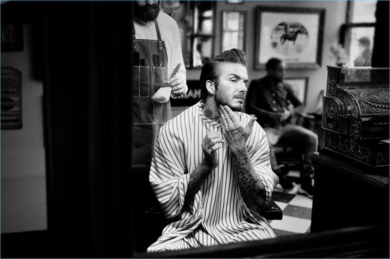 Pictured at the barber shop, David Beckham promotes House 99.