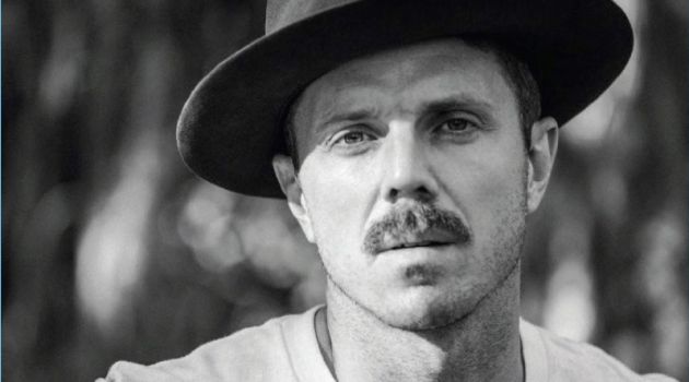 Jake Shears wears a Levi's Vintage Clothing shirt with a Worth & Worth hat.