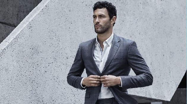 Noah Mills suits up in Ted Baker.