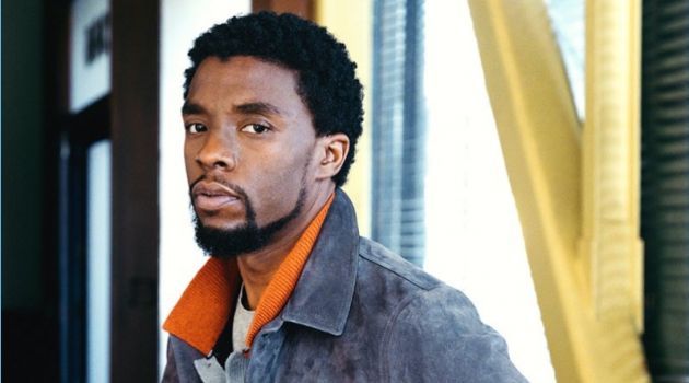 A smart vision, Chadwick Boseman wears a Berluti suede jacket, Saint Laurent t-shirt, and Gucci jeans. The Black Panther actor also rocks a striped knit from The Elder Statesman.