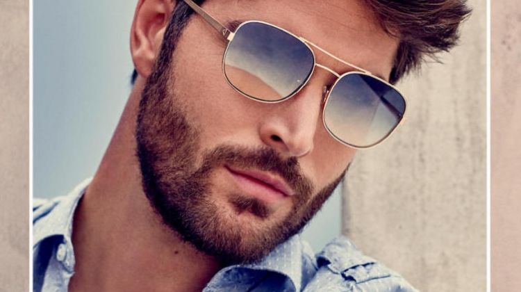 A cool vision in sunglasses, Nick Bateman stars in Guess' spring-summer 2018 accessories campaign.