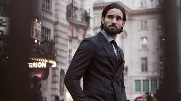 Jamie Jewitt is dressed to impress with a Reiss pinstripe double-breasted blazer and trousers. He also wears a houndstooth check shirt and polka dot tie.