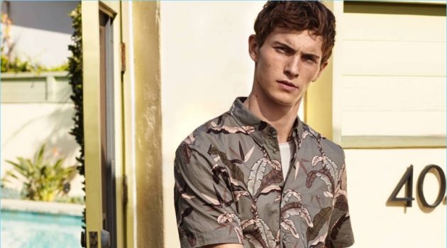 Model Luc Defont-Saviard dons a printed short-sleeve shirt from H&M.