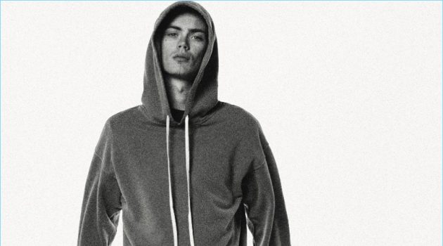 Front and center, Simon Kotyk wears a hoodie and sweats by BILLY.