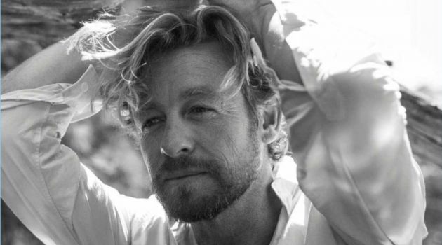 Appearing in a black and white photo, Simon Baker wears a Salvatore Ferragamo shirt.