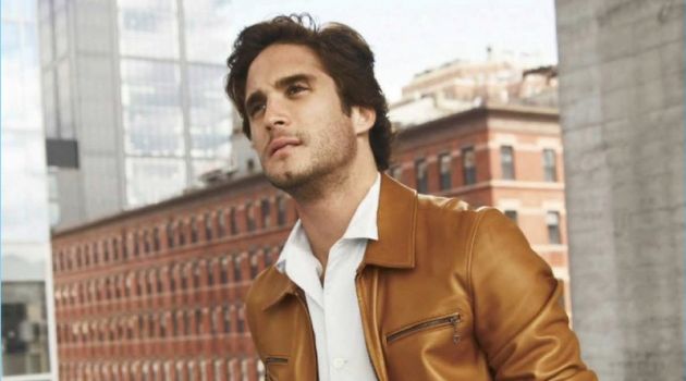 A smart vision, Diego Boneta wears a shirt and leather jacket by Salvatore Ferragamo. Boneta also rocks Prada trousers.