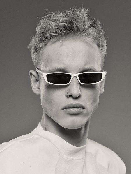 Dmitry wears sunglasses ASOS and t-shirt Vetements.