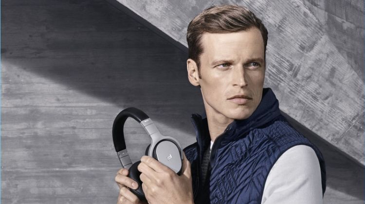 Model Lars Burmeister poses with headphones from Porsche Design.